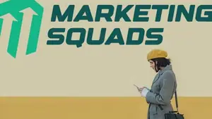 young woman using smartphone and wearing yellow beret and a gray coat below marketing squads logo